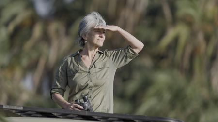 Elephant expert Joyce Poole poses for a photo. She has studied elephants for almost 5 decades and along with her husband has created the elephant ethogram, the first comprehensive library of thousands of elephant behaviors. There's nothing like this for any other species on earth. (National Geographic for Disney/Wim Vorster)