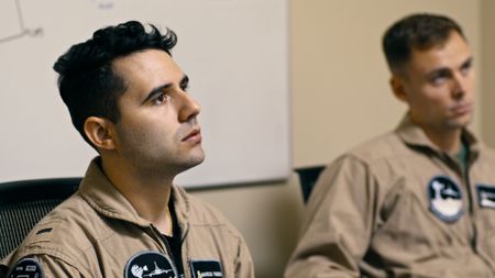 Student LTJG Marcus Figueroa in a pre-flight briefing. (Credit: National Geographic)