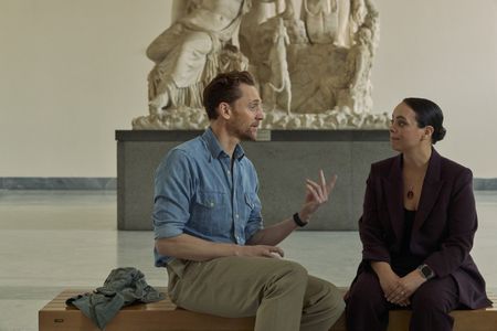 Tom Hiddleston and Dr. Sarita Robinson discuss the history of Pompeii from inside the National Archaeological Museum of Naples. (National Geographic/Paolo Verzone)