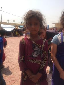 IRAQ - A young refugee child inside the Debaga Refugee Camp. (photo credit: Junger Quested Films LLC/Nick Quested)