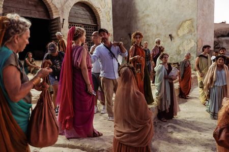 Tom Barbor-Might (Director, Showrunner, EP) briefs Christina Cole as Helvia, on the set of Herculaneum, behind-the-scenes of Pompeii: Out of Time with Tom Hiddleston. (National Geographic/Darrin Zammit Lupi)