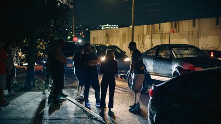 Mariana van Zeller watches an illegal street race in the Bronx. (National Geographic)