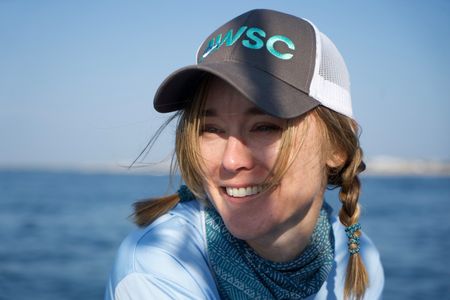 Dr. Megan Winton looks out to sea. (National Geographic/Brandon Sargeant)