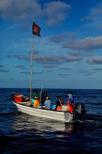 Mariana van Zeller interviews the shark fishermen on a boat. (National Geographic)