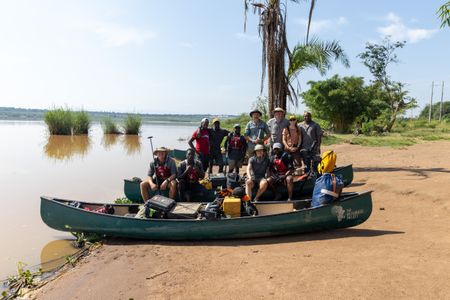 The source of the Nile expedition team preparing to launch their boats on the Kagera River in Rwanda. (National Geographic/Philip Jones)