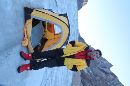 Alex Honnold stands by his tent on the glacier. (photo credit: National Geographic/Matt Pycroft)