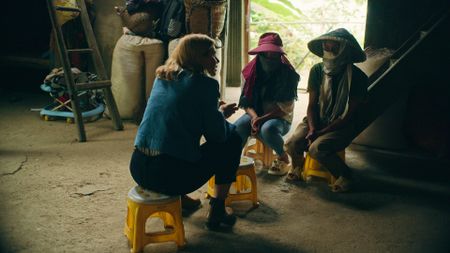 Mariana van Zeller speaks with two people who were arrested for trafficking a woman to China.   (Credit: National Geographic)