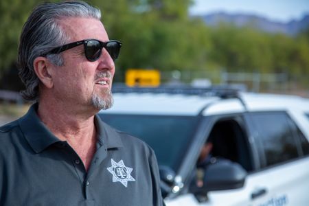 Bruce Anderson, Pima County Medical Examiner's Office, looks out to the site where Jane Doe's body was discovered in 1992. (National Geographic/Tom Beard)