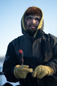 Tig Strassburg sets wolverine and wolf traps in the winter season. (National Geographic/Pat Henderson)