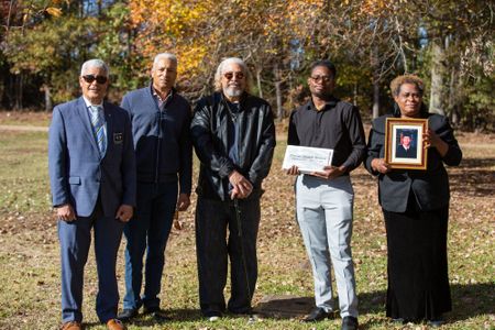 David Brown's relatives meet for the first time to mark his grave. (L-R: Michael Gaines, Brett Gaines, Robert Gaines, Braylon Brown, Marilyn Brown). (National Geographic/Tom Beard)