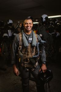 Student Captain Micah Nissly stands for a portrait in the paraloft. (Credit: National Geographic/Freddie Claire)