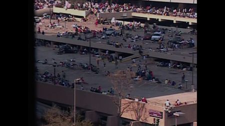 Crowds of stranded New Orleans residents gather outside of the Superdome following Hurricane Katrina in 2005. (CNN)