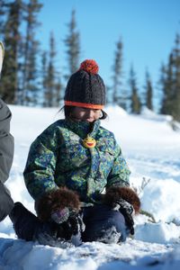 Sophie Strassburg with her father setting beaver traps. (National Geographic/Pat Henderson)