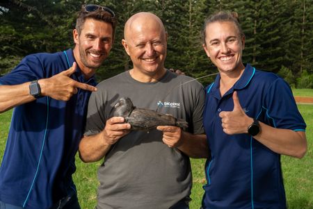 Charlie Huveneers, Adam Barnett, and Lauren Meyer preparing to deploy 'Shaza' the Birdcam. (National Geographic/Sophy Crane)