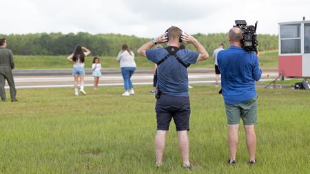 Director Chris Parkin and camera Charlie Laing filming family day. (Credit: National Geographic/Freddie Claire)