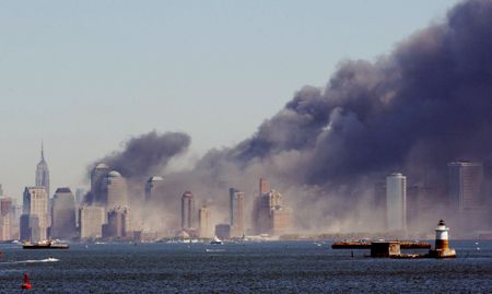 Smoke billows from lower Manhattan on Sept. 11, 2001, in New York. (AP Photo/Chad Rachman)