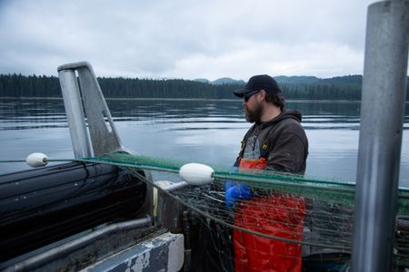 Carl Hernandez fishes for salmon. (National Geographic/Lukas Taylor)
