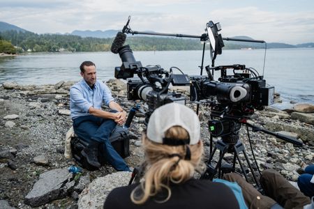 Joseph Fiennes is interviewed as he and Sir Ranulph Fiennes revisit Ran’s 1971 expedition of Canada’s British Columbia. Amidst mountains and whale watching, Sir Ranulph Fiennes and his cousin Joseph Fiennes reflect on Ran’s epic life and his new challenge of life with Parkinson’s. (National Geographic)