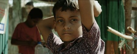 A boy in the Kutupalong Refugee Camp. Lost and Found, directed by Academy Award winner Orlando von Einsiedel (“The White Helmets”, “Virunga"), is an inspiring story of humanity and heroism in the world’s largest refugee camp, that follows Kamal Hussein, a Rohingya refugee who has dedicated his life to reuniting children with their parents. (Nobel Media/Franklin Dow)