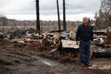Paradise, CA - Jim Nobel, local business owner, at his orchard. (National Geographic/Lincoln Else)