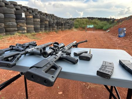 Weapons pointed down range toward bullet-proof glass. (National Geographic)