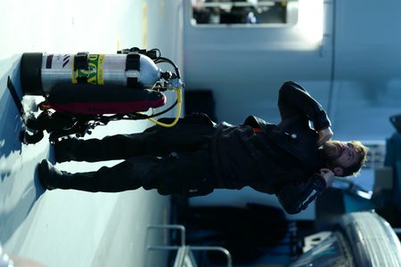 Aldo Kane gears up for a dive. (National Geographic/Mario Tadinac)