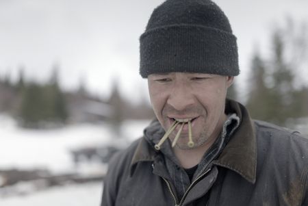 Joel Jacko builds a dock in the winter season. (National Geographic/Wayne Shockey)