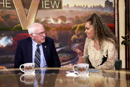 BERNIE SANDERS, SUNNY HOSTIN