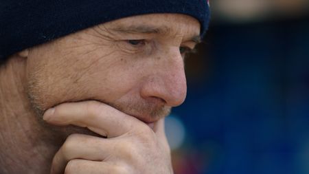 Will Gadd watches footage of his triumph at Helmcken Falls. (National Geographic)