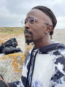 Gibbs Nuguru looking out to the beach. (National Geographic/Robert Cowling)