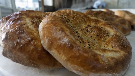 Freshly baked Ramadan Pide is pictured in Iznik, Turkey. Turkish bakers make this bread one month a year, to celebrate the Muslim holiday of Ramadan. (National Geographic/Madeline Turrini)
