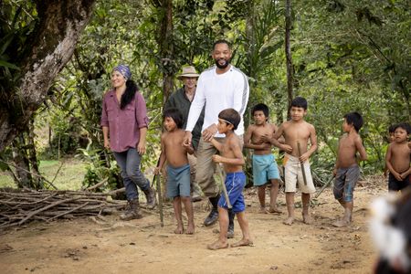 Expedition Leader Carla Perez, Will Smith and Professor of Toxicology Bryan Fry meet the Waorani people in the Ecuadorian rainforest.  (credit: National Geographic/Kyle Christy)