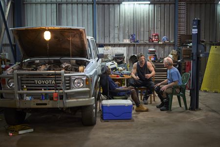 Chris and his father Craig meet with a friend, Spencer, in Bulman on their first visit back in 35 years. (credit: National Geographic/Craig Parry)