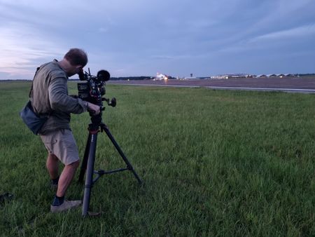 DOP Jon Southgate-Sayers fiilms a departing T-45. (Credit: National Geographic/Evan Parker)