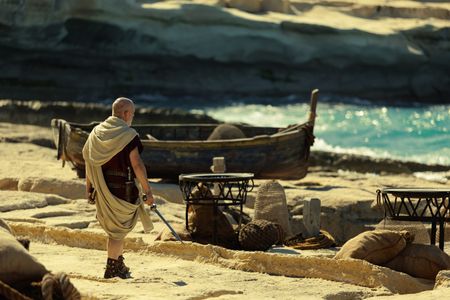 The Praetorian, played by Barry Aird, walks towards the sea at Herculaneum, trailing his sword in his right hand. (National Geographic/Darrin Zammit Lupi)