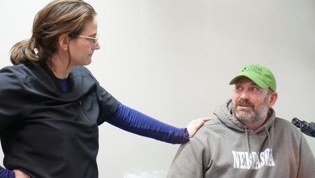 Drs. Erin and Ben Schroeder talk about the prognosis for Suh, a ten-year-old black lab with a fast-growing leg tumor. (National Geographic)
