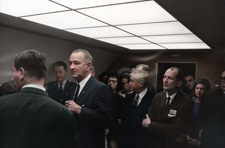This colorized archival image shows those attending the swearing-in ceremony of Lyndon B. Johnson (LBJ) as President aboard Air Force One, Nov. 22, 1963, in Dallas. (Cecil Stoughton/White House Photographs/John F. Kennedy Presidential Library and Museum, Boston)