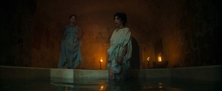 Amalthea, played by Buket Komur, and Julia Felix, played by Lubna Azabal, in Julia's bath house. (National Geographic)
