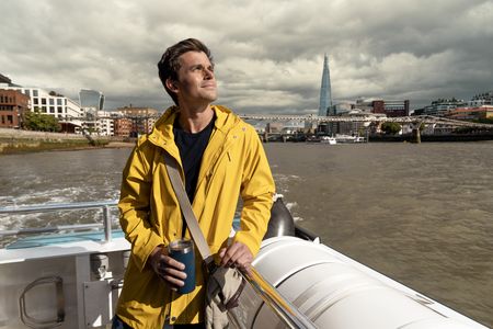 Antoni Porowski takes a boat ride down the Thames, as seen in Best of the World with Antoni Porowski. (National Geographic/John Wendle)