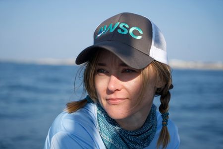 Dr. Megan Winton looks out to sea. (National Geographic/Brandon Sargeant)