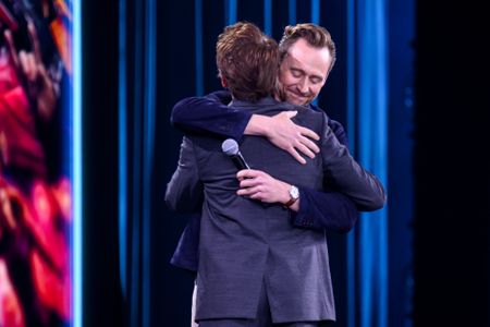 ROBERT DOWNEY JR., TOM HIDDLESTON