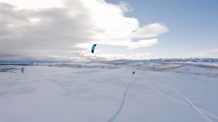 Sarah McNair Landry kite-skis. (photo credit: National Geographic/Ross Mcdonnell)
