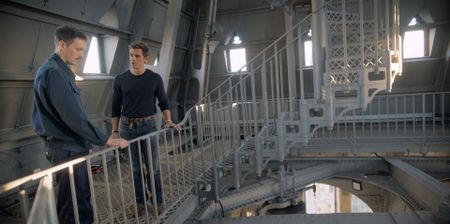 Clock Mechanic Andrew Strangeway and Antoni Porowski chat inside of Big Ben. (National Geographic)