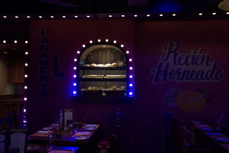 A bakery storefront is part of the dÈcor bringing the animated film "Coco" to life in Plaza de Coco on the Disney Treasure.  (credit: National Geographic/Matt Perez)