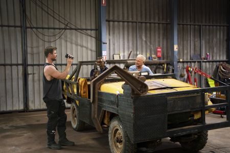 Chris and his father Craig meet with a friend, Spencer, in Bulman on their first visit back in 35 years. (credit: National Geographic/Craig Parry)