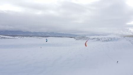 Sarah-McNair Landry Kite Skiing.   (photo credit: National Geographic /Ross McDonnell)