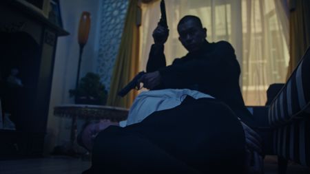 A reenactment of Chen Chin-hsing holding McGill Alexander hostage in his home. (©2019 MCN International Pte Ltd. All Rights Reserved.)
