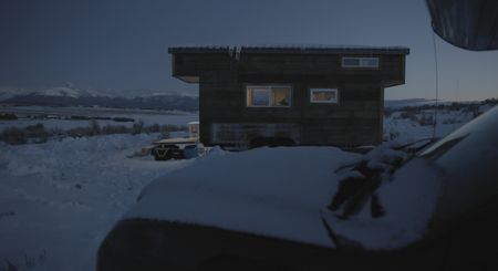Sarah McNair-Landry and her partner, Erik Boomer, inside their tiny home in Idaho.  (photo credit: National Geographic /Ross McDonnell)