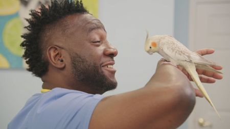 Dr. Hodges is amazed to hear that Sunny, the cockatiel, flew nearly 30 miles crossing city limits. (National Geographic for Disney)
